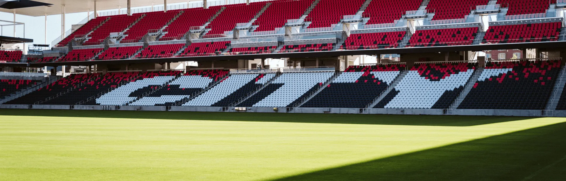 A wide view shot of a sports stadium seating area.