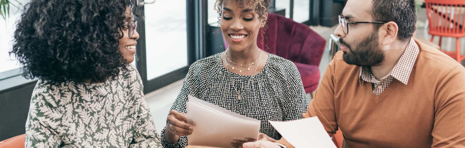 couple with paperwork having conversation